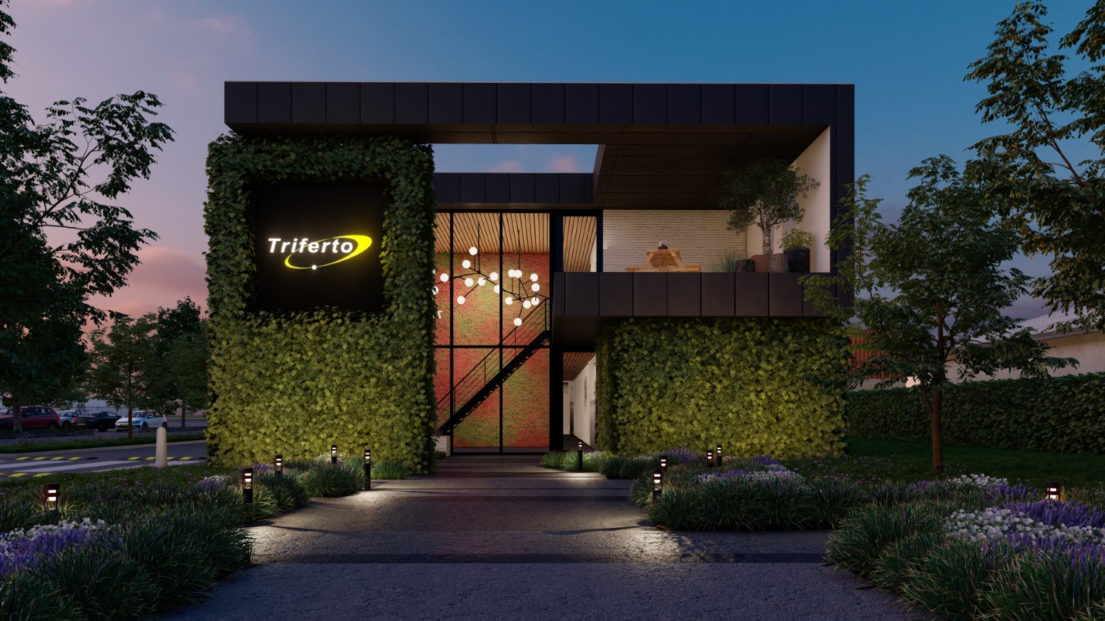 Avondzicht op gerenoveerd bedrijfspand met groene gevel, verlichting en open structuur &ndash; duurzaam bedrijfspand ontwerpen