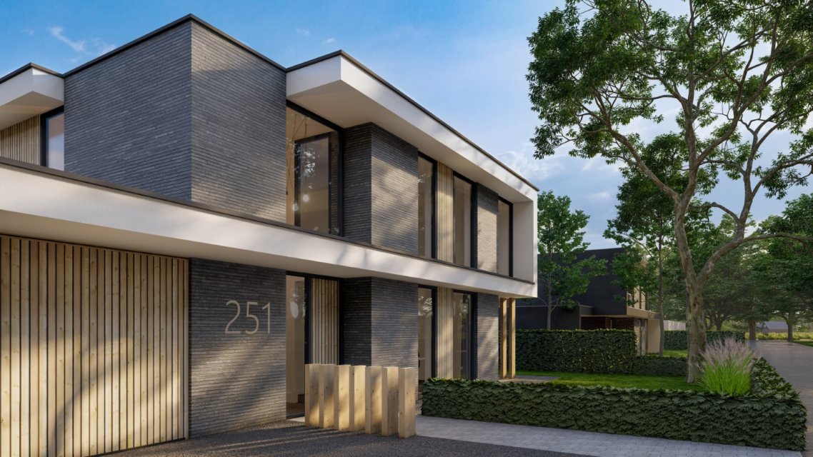 Strakke hoekwoning met donker metselwerk, houten gevelaccenten en wit kader &ndash; ontwerp Bongers Architecten Oud-Alblas
