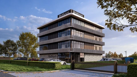 Modern bedrijfspand met houten gevel en grote glaspartijen &ndash; bedrijfspand ontwerpen met focus op duurzaamheid en licht in architectuur.